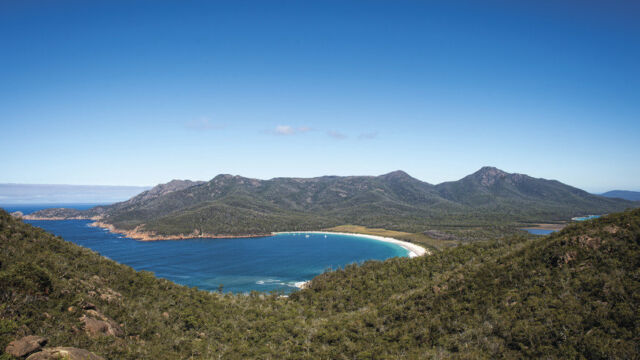 Wineglass Bay from Mt Amos Wineglass Bay from Mt Amos on the Wineglass Bay Track, Freycinet National Park, TAS Australia