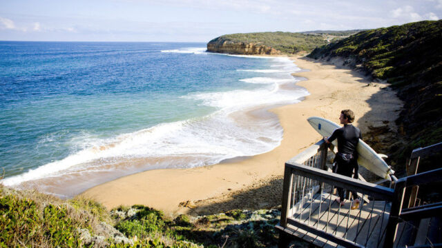 Surfer Bells Beach Surfer Bells Beach, Great Ocean Road, Australia