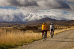 Cyclists on Otago Rail Trail near Oturehua, Central Otago Cyclists on Otago Rail Trail near Oturehua, Central Otago, New Zealand.