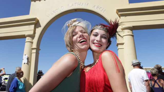 Harold Latham Arch Smiling ladies in front of Harold Latham Arch