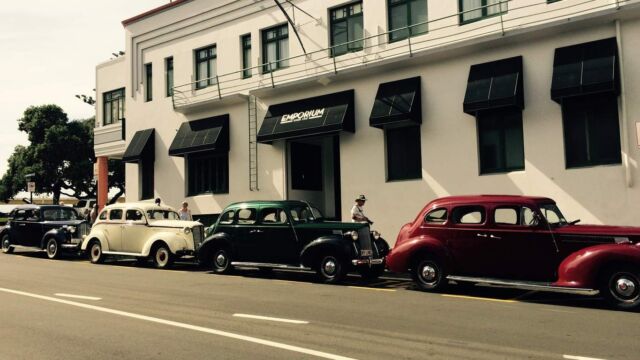 Vintage Car with Art Deco Masonic Hotel Vintage Car with Art Deco Masonic Hotel