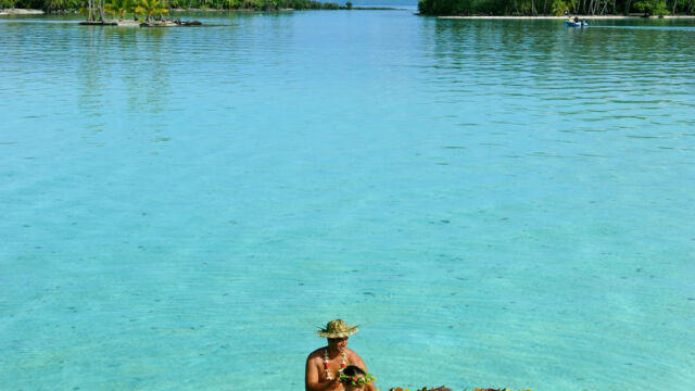 View of the lagoon and canoe from Tahaa resort restaurant