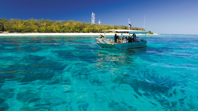 Glass Bottom boat near lighthouse
